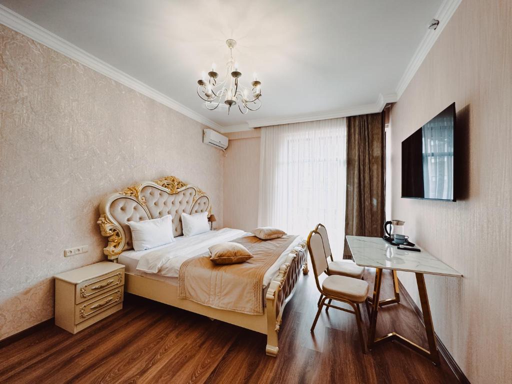 Postel nebo postele na pokoji v ubytování Armenia Hotel