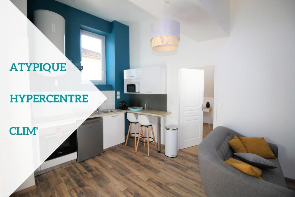 Apartamento con cocina y sala de estar. en Appart'hôtel Le Pin en La Tour-du-Pin