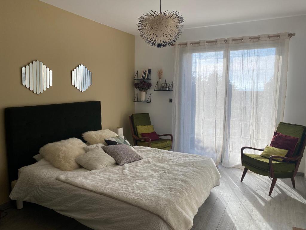 Postel nebo postele na pokoji v ubytování 1,2,3 soleil