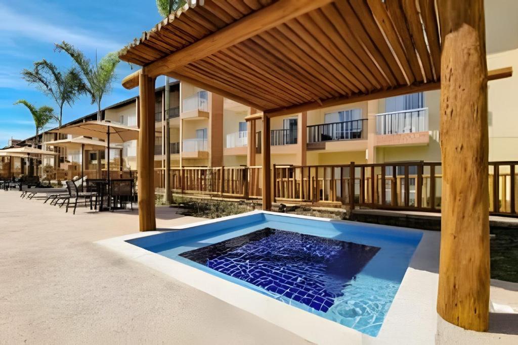 Bazén v ubytování Ondas Praia Resort em Porto Seguro nebo v jeho okolí