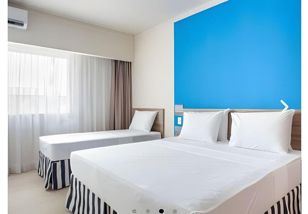 Postel nebo postele na pokoji v ubytování Ondas Praia Resort em Porto Seguro
