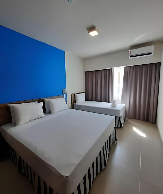 Postel nebo postele na pokoji v ubytování Ondas Praia Resort em Porto Seguro
