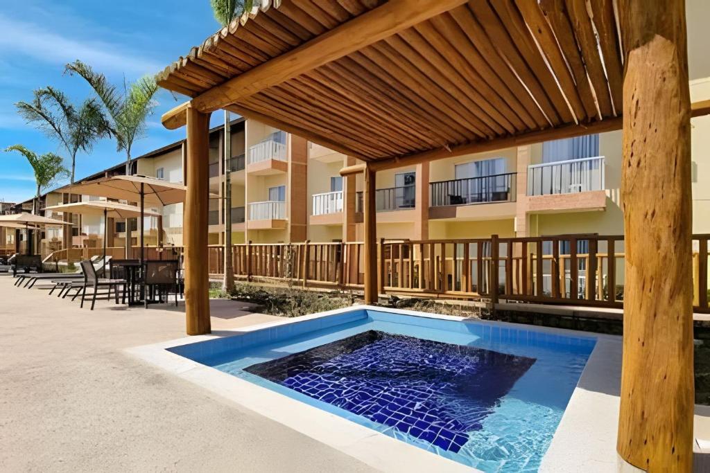 Bazén v ubytování Ondas Praia Resort em Porto Seguro nebo v jeho okolí