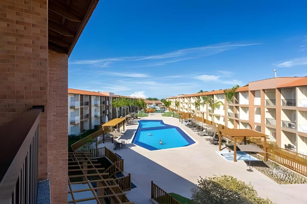 Bazén v ubytování Ondas Praia Resort em Porto Seguro nebo v jeho okolí