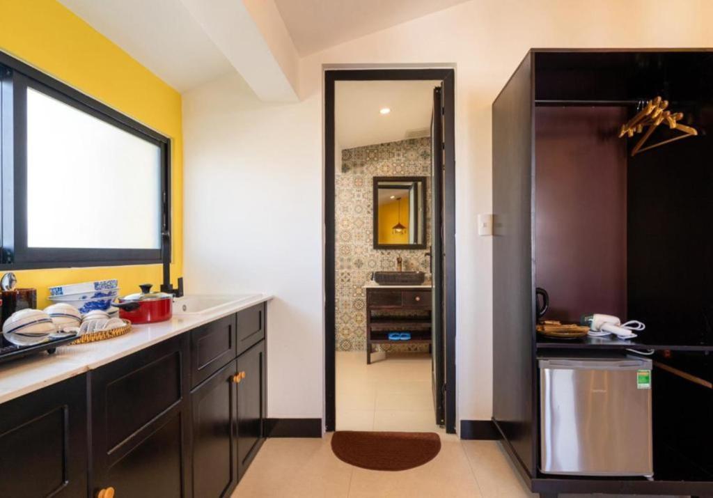 Kuchyň nebo kuchyňský kout v ubytování Coco Viet Homestay