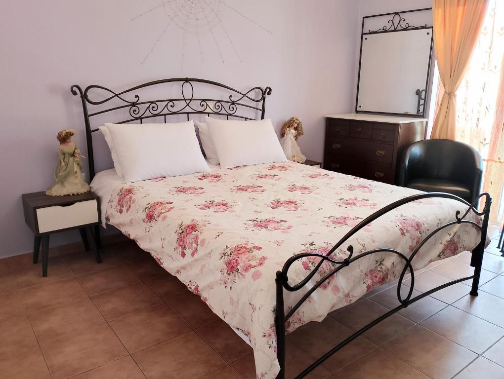 Postel nebo postele na pokoji v ubytování LIGEIA HOME