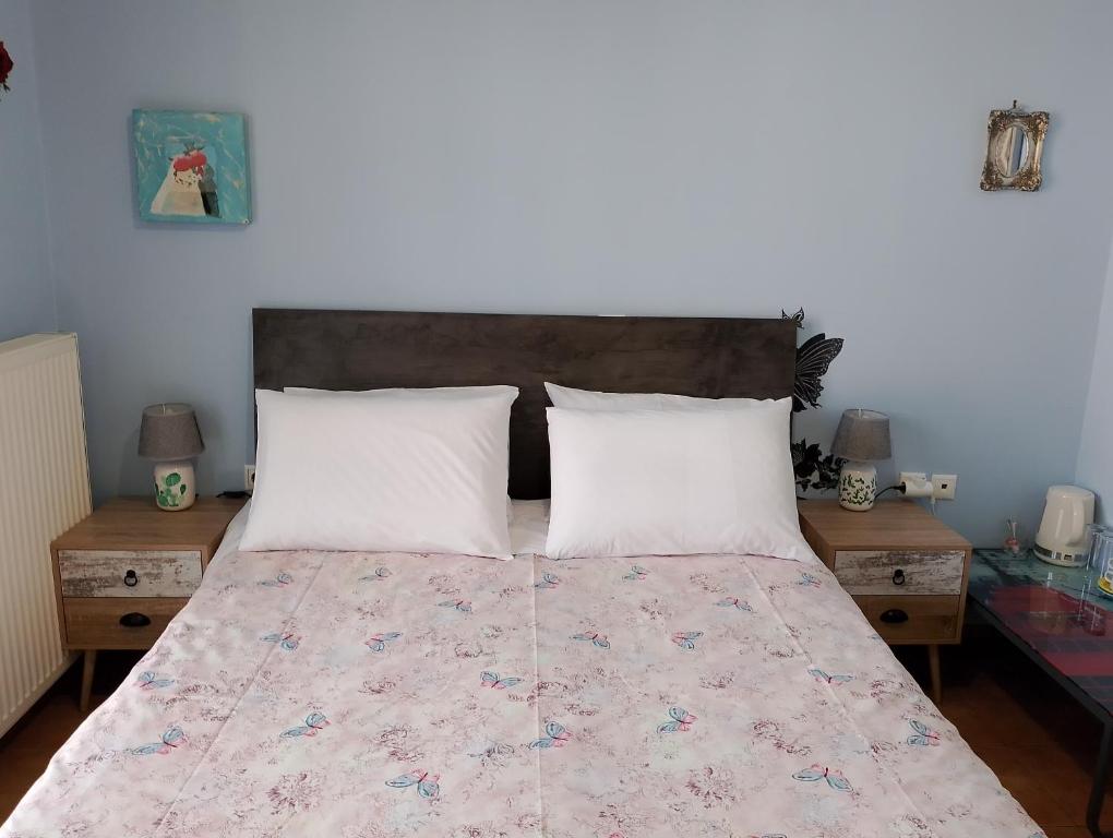 Postel nebo postele na pokoji v ubytování LIGEIA HOME
