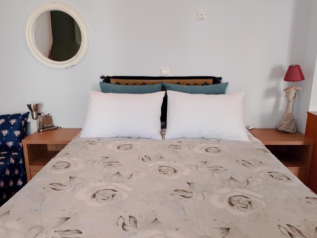 Postel nebo postele na pokoji v ubytování LIGEIA HOME