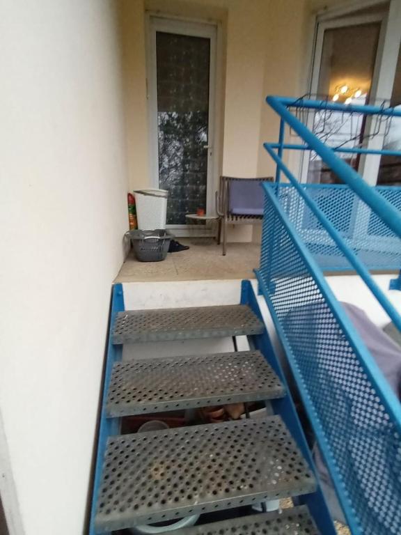 Balkón alebo terasa v ubytovaní L'Intemporel - Appartement T3 avec jardinet