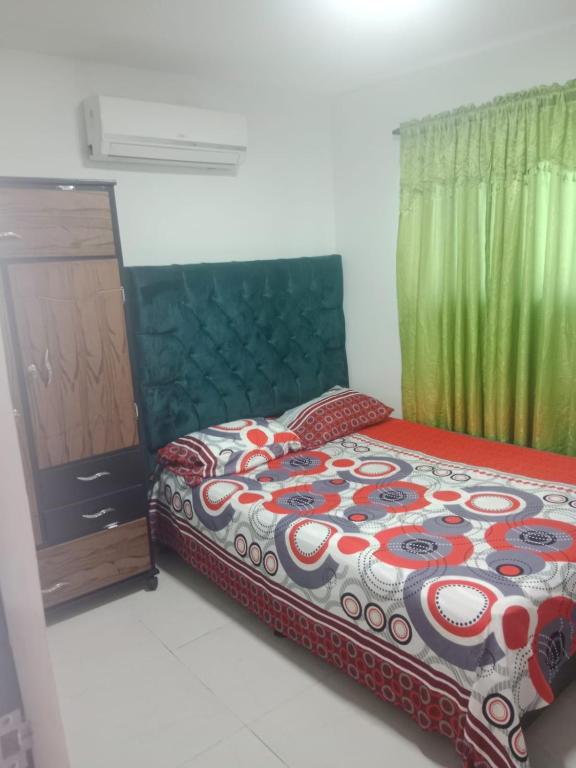 Postel nebo postele na pokoji v ubytování Apartamento turistico Mariangel