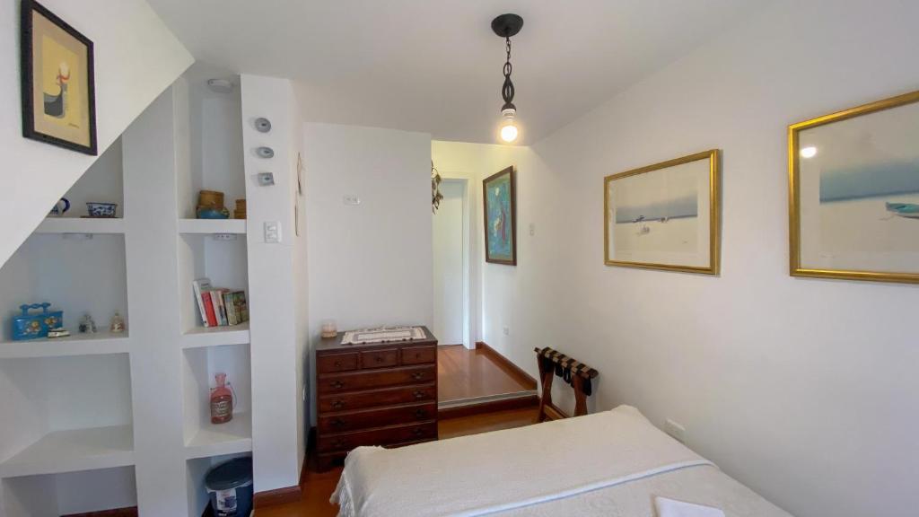 Postel nebo postele na pokoji v ubytování Sakti Hostal B&B