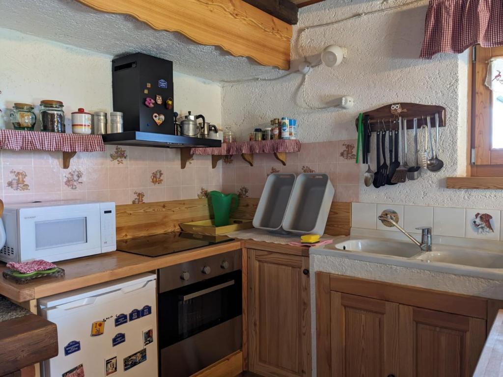 Kuchyňa alebo kuchynka v ubytovaní Baita Nido tra i Monti