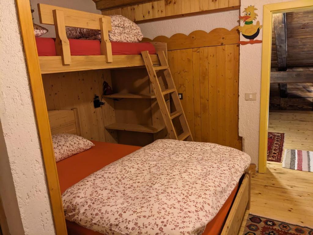 Posteľ alebo postele v izbe v ubytovaní Baita Nido tra i Monti