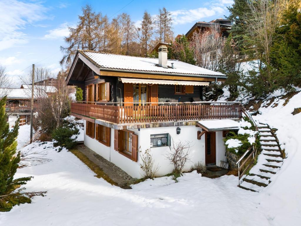 a house in the snow with snow covered ground at Darjean - 8 pers - belle vue in Plan Fey