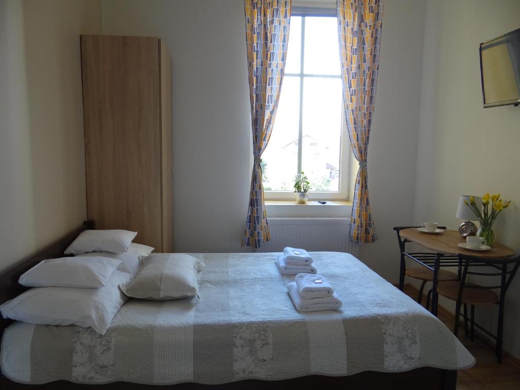 Posteľ alebo postele v izbe v ubytovaní The Lion Rooms