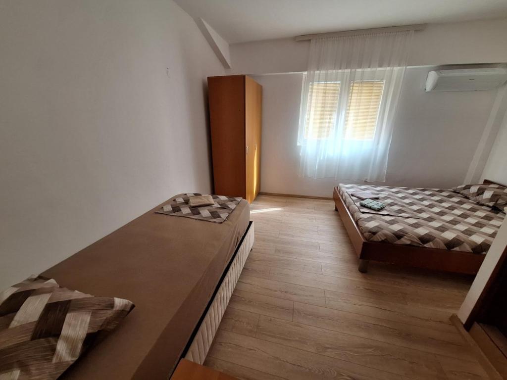 Postel nebo postele na pokoji v ubytování Hostel Izvor