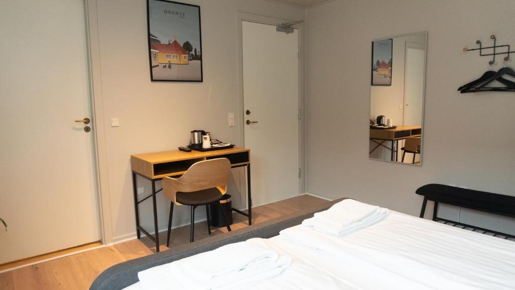 Ein Bett oder Betten in einem Zimmer der Unterkunft Hotel Smedegaarden