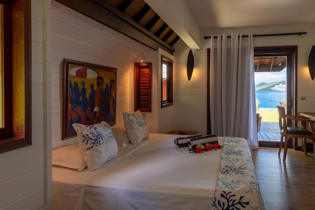 Postel nebo postele na pokoji v ubytování Villa Kahaia Bora Bora