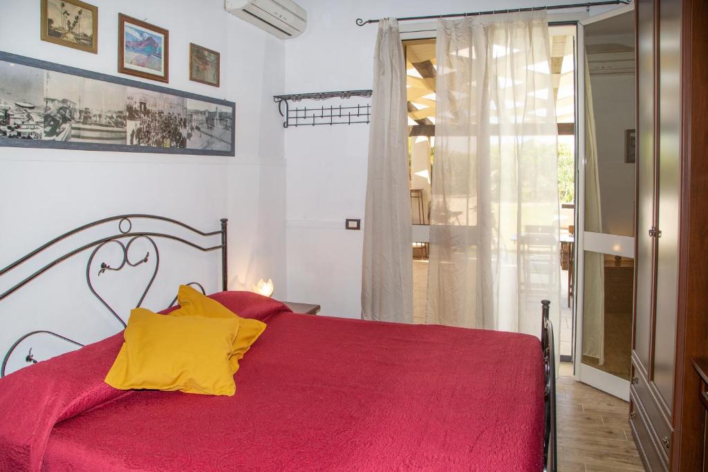 Postel nebo postele na pokoji v ubytování BeB Nonno Baffo