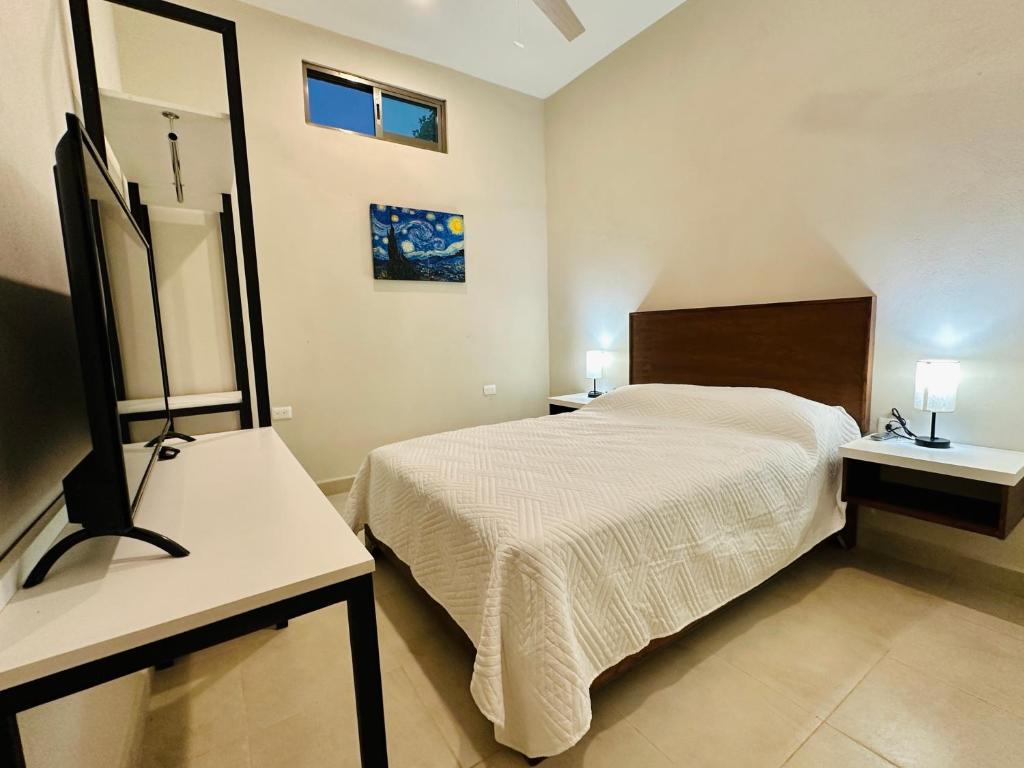 TV a/nebo společenská místnost v ubytování Villas Mar Turquesa Cozumel