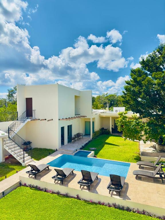 Bazén v ubytování Villas Mar Turquesa Cozumel nebo v jeho okolí