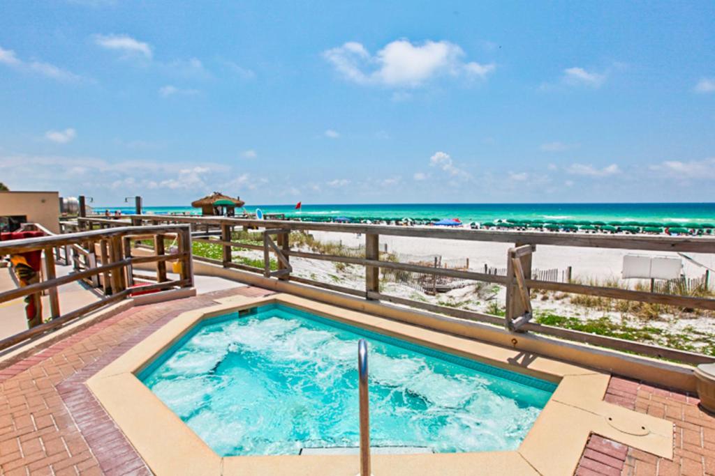 a hot tub with the beach in the background at Sundestin Beach Resort in Destin