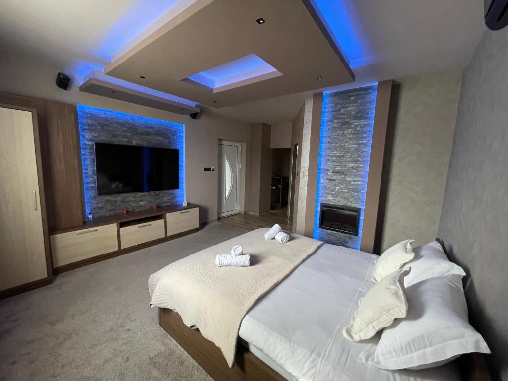 Postel nebo postele na pokoji v ubytování Apartmani Aso-Ler