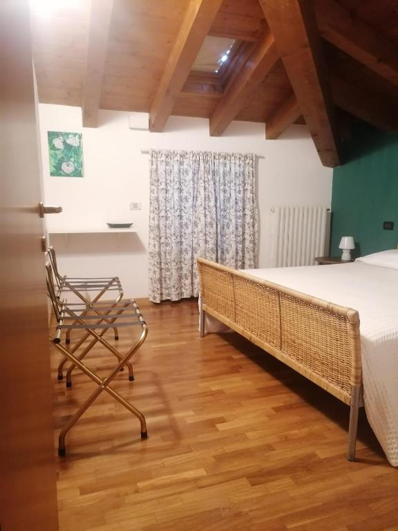 Postel nebo postele na pokoji v ubytování Quadrisfera Apartment