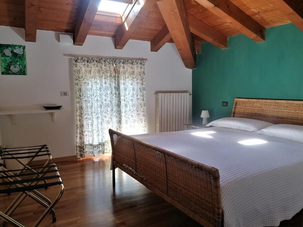 Postel nebo postele na pokoji v ubytování Quadrisfera Apartment