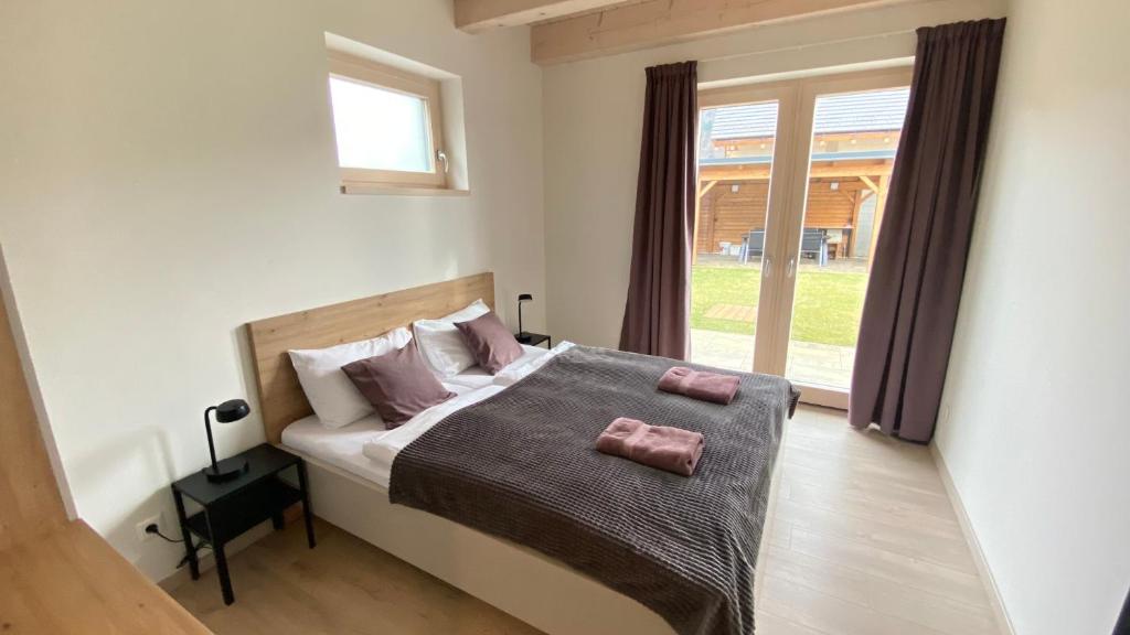 Postel nebo postele na pokoji v ubytování Chalet MIA