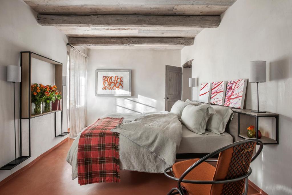 Postel nebo postele na pokoji v ubytování Monteverdi Tuscany