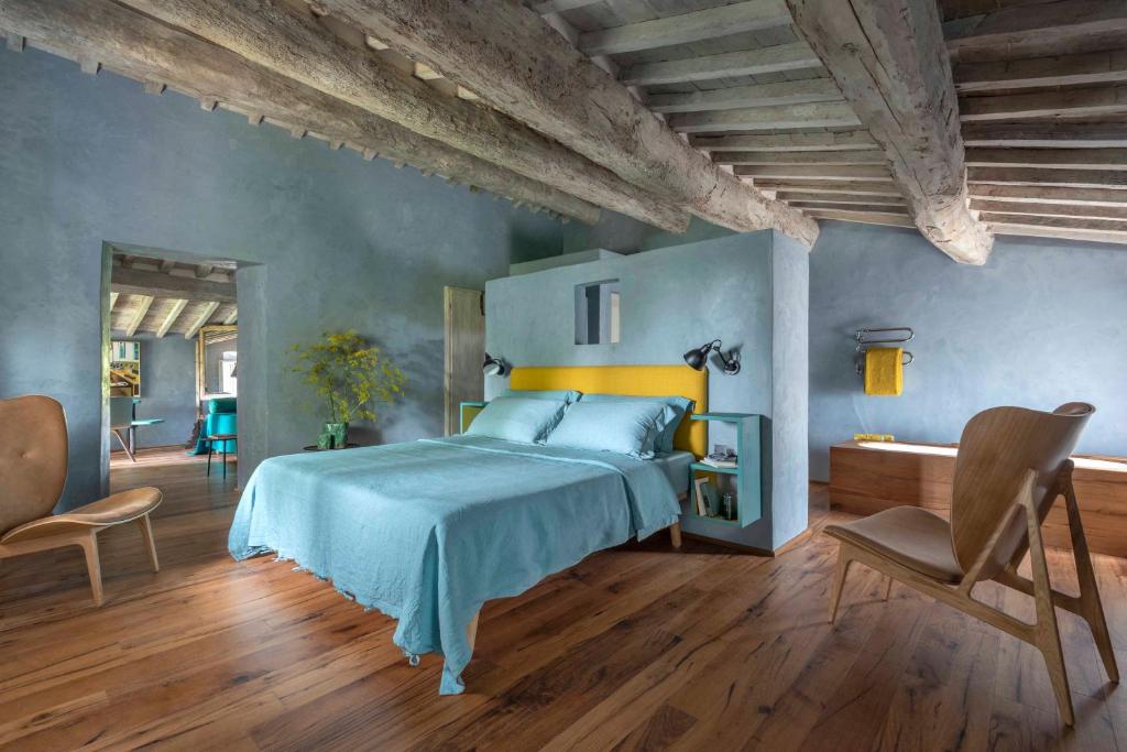 Postel nebo postele na pokoji v ubytování Monteverdi Tuscany