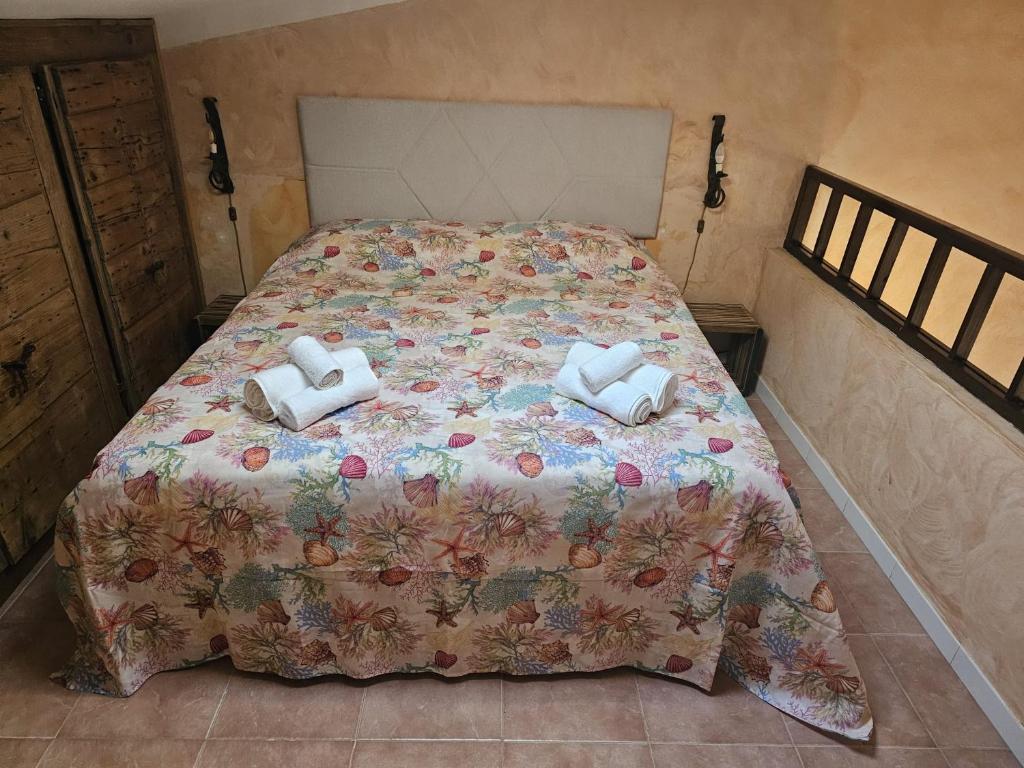 Cama o camas de una habitación en Coralli House