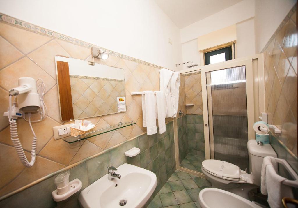 Koupelna v ubytování Hotel Donna Rosa