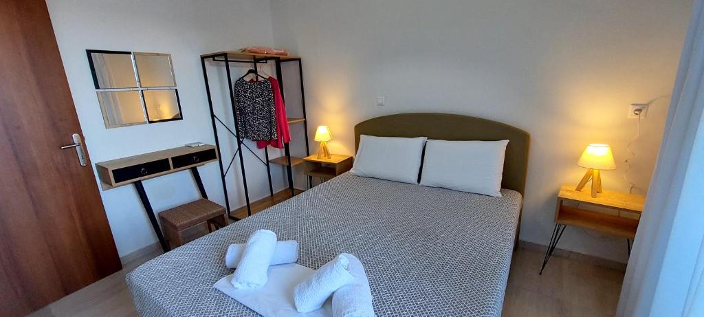 Łóżko lub łóżka w pokoju w obiekcie Avista apartments