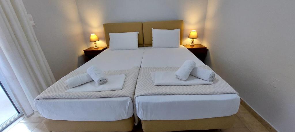 Łóżko lub łóżka w pokoju w obiekcie Avista apartments
