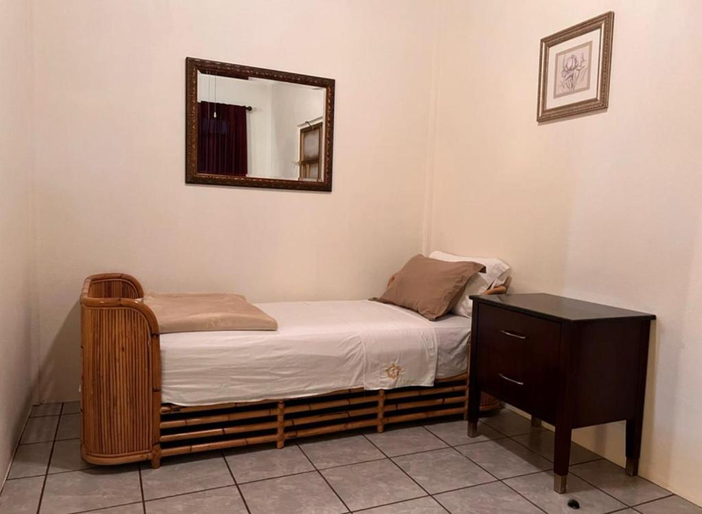 Postel nebo postele na pokoji v ubytování Hotel & Eventos Xalos