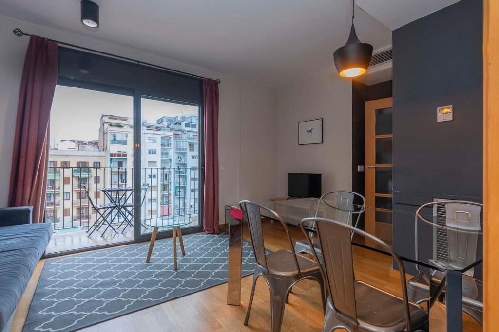 TV a/nebo společenská místnost v ubytování Modern and bright apartment in Eixample 5-1