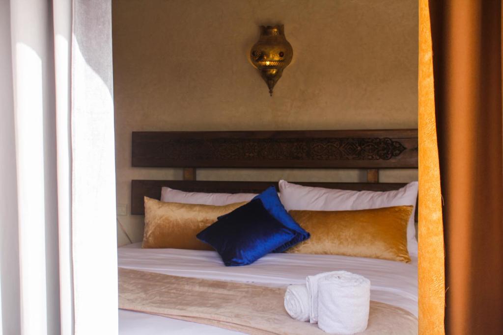 Postel nebo postele na pokoji v ubytování Maison D'hôtes IMINIGRAN & Spa