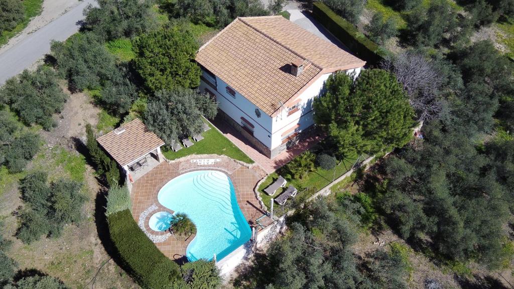 an overhead view of a house with a swimming pool at Casa Lo Pinto Private Pool Villa South of El Torcal in La Joya