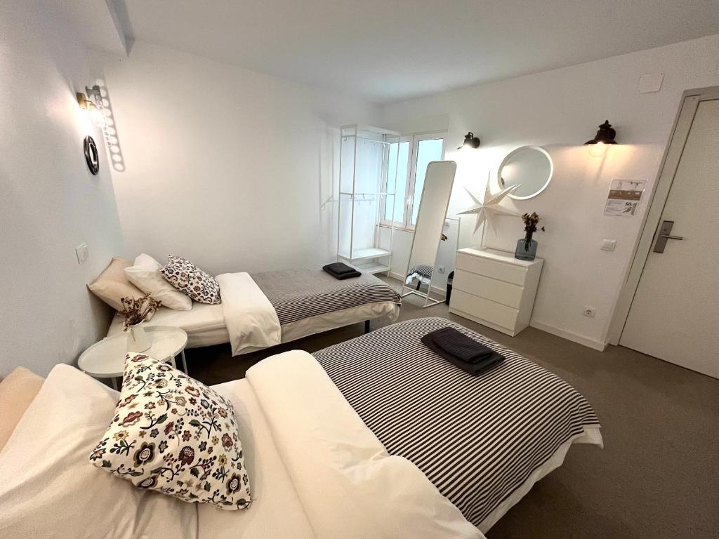 Postel nebo postele na pokoji v ubytování Hola Hostel Alicante