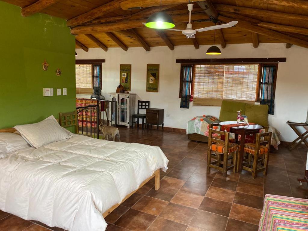 Postel nebo postele na pokoji v ubytování CASA SAMAÑA