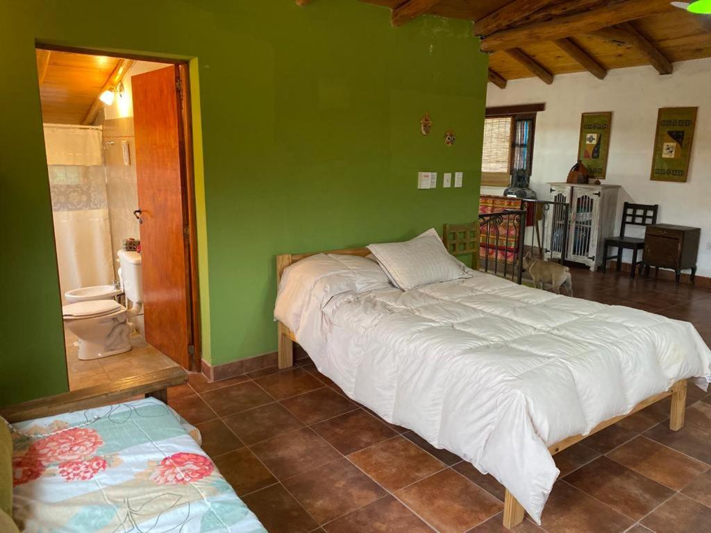 Postel nebo postele na pokoji v ubytování CASA SAMAÑA