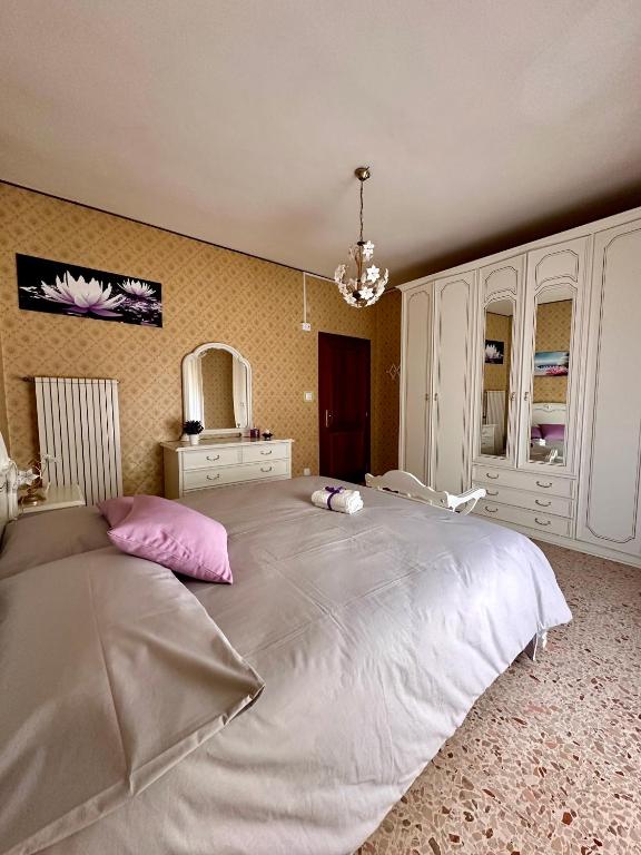 Postel nebo postele na pokoji v ubytování Affittacamere La Dimora dei Nonni