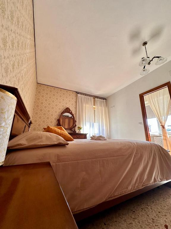 Postel nebo postele na pokoji v ubytování Affittacamere La Dimora dei Nonni