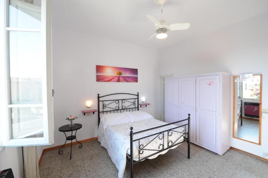 Postel nebo postele na pokoji v ubytování Hotel Le Giare
