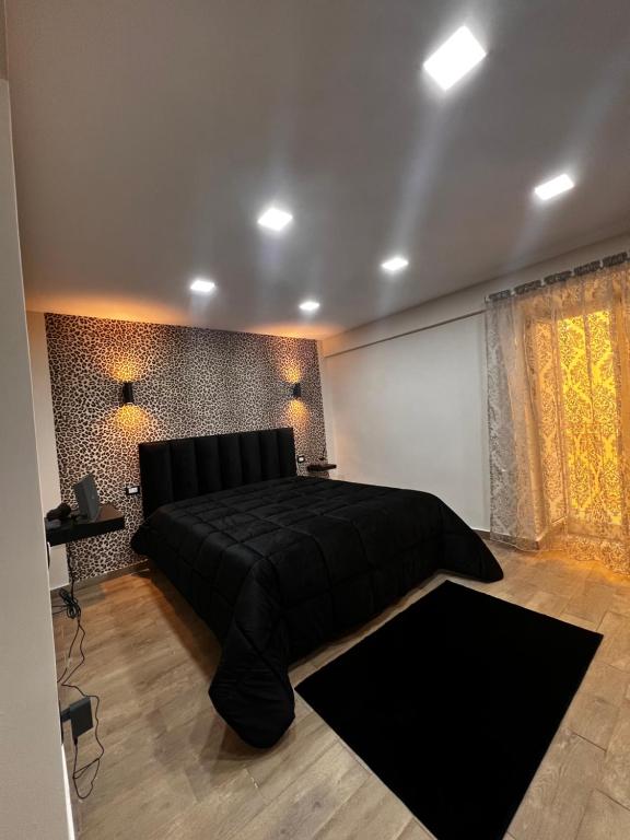 Кровать или кровати в номере B&B Zia Giuseppina & Rosa alla Riviera di Chiaia