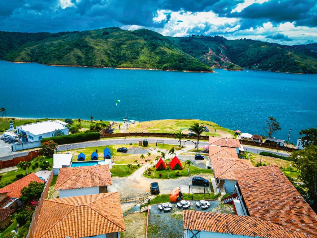 an aerial view of a resort with a lake at CABAÑAS SALOME LAGO CALIMA in Calima