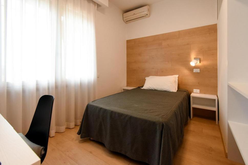 Postel nebo postele na pokoji v ubytování CRICHELON