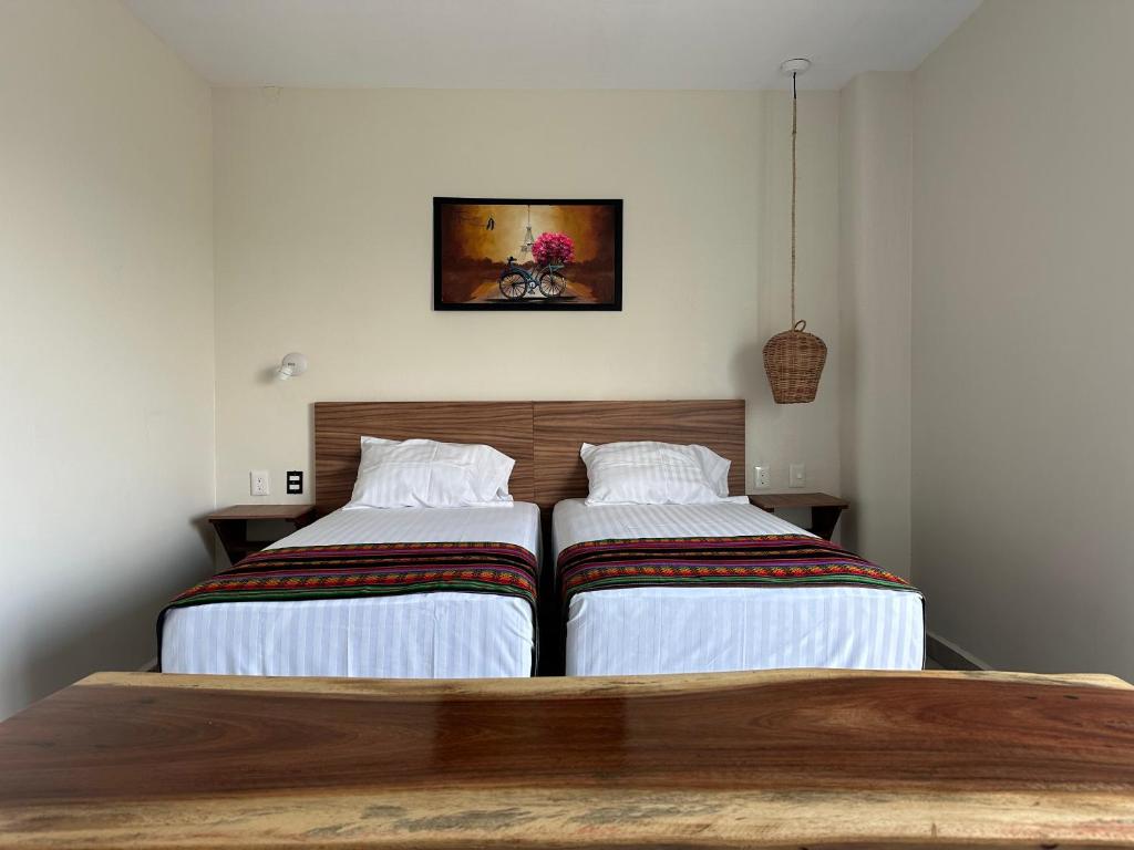 Postel nebo postele na pokoji v ubytování Oneiro Suites with Sea View